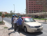 workers taking a taxi