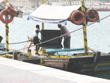 men on boat