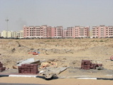 international city from emirates road