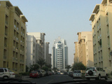 greens with skyscraper